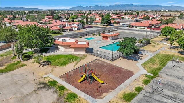 10395 Shahaptain Ave, Hesperia, CA 92345 - aerial view of residential area with a pool and mountains