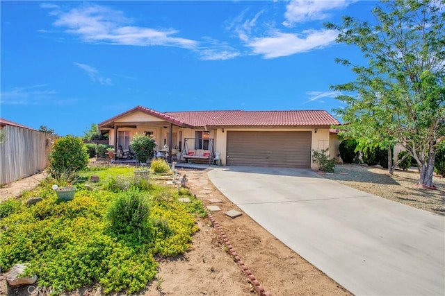 10395 Shahaptain Ave, Hesperia, CA 92345 - single story home with a tiled roof, stucco siding, an attached garage, and concrete driveway