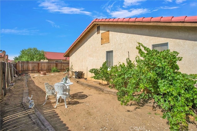 10395 Shahaptain Ave, Hesperia, CA 92345 - view of home's exterior with stucco siding and a fenced backyard