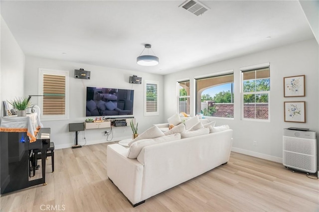 16138 Solitude Ave, Chino, CA 91708 - living room with light wood-style floors and baseboards