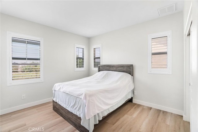 16138 Solitude Ave, Chino, CA 91708 - bedroom featuring light wood finished floors and baseboards