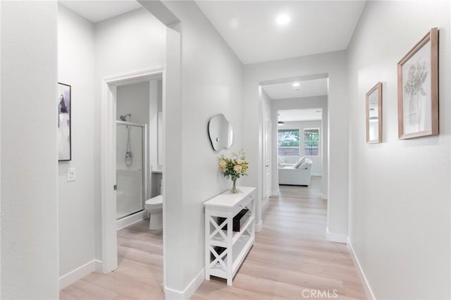16138 Solitude Ave, Chino, CA 91708 - hallway featuring light wood-style floors and recessed lighting