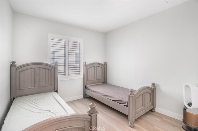16138 Solitude Ave, Chino, CA 91708 - bedroom featuring light wood-style floors