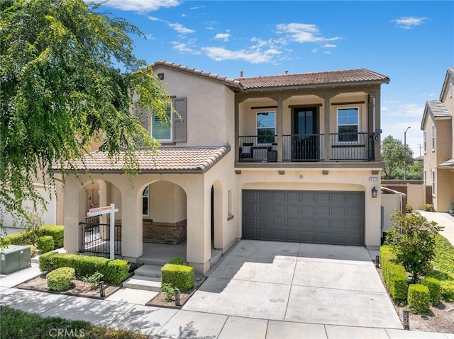 16138 Solitude Ave, Chino, CA 91708 - view of front of house with stucco siding, a balcony, a tiled roof, a porch, and an attached garage