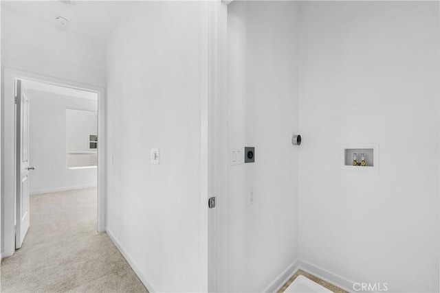 94191/2 N Sepulveda Blvd Unit 1, North Hills, CA 91343 - washroom featuring washer hookup, electric dryer hookup, and light carpet