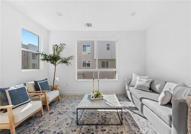 94191/2 N Sepulveda Blvd Unit 1, North Hills, CA 91343 - carpeted living room featuring baseboards