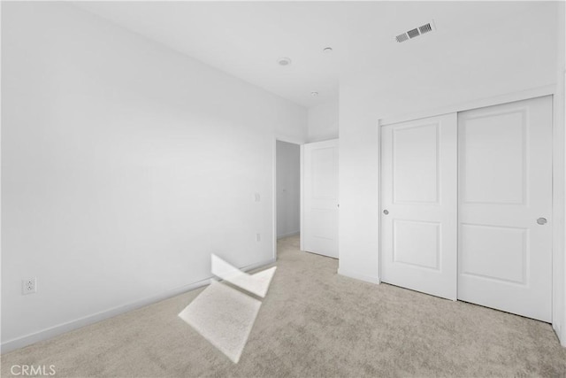 94191/2 N Sepulveda Blvd Unit 1, North Hills, CA 91343 - unfurnished bedroom with carpet and a closet