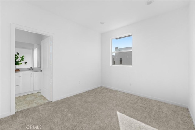 94191/2 N Sepulveda Blvd Unit 1, North Hills, CA 91343 - empty room featuring light colored carpet and baseboards