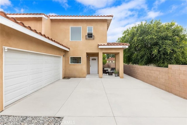 418 N Dalton Ave, Azusa, CA 91702 - view of front of home with a tile roof, stucco siding, and concrete driveway