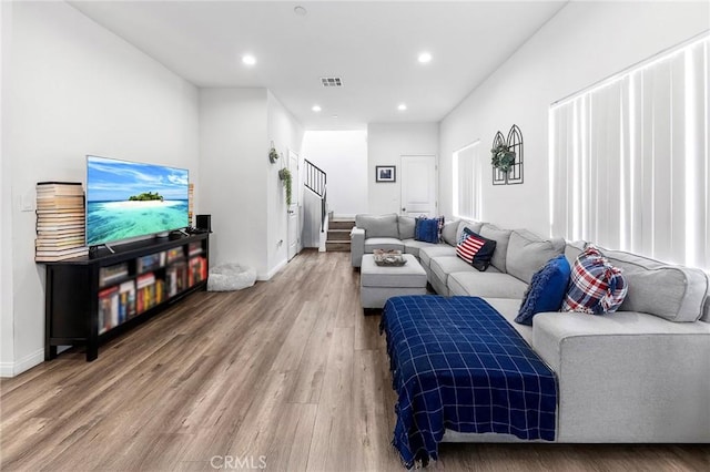 418 N Dalton Ave, Azusa, CA 91702 - living room featuring stairs, wood finished floors, and recessed lighting