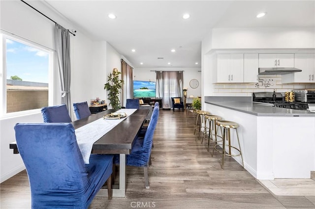 418 N Dalton Ave, Azusa, CA 91702 - dining room with wood finished floors and recessed lighting