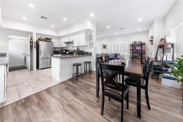 418 N Dalton Ave, Azusa, CA 91702 - dining area with recessed lighting and light wood finished floors