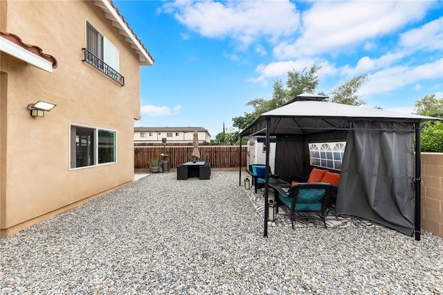 418 N Dalton Ave, Azusa, CA 91702 - fenced backyard with a gazebo, outdoor lounge area, and a patio