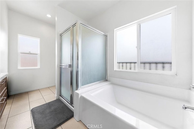 418 N Dalton Ave, Azusa, CA 91702 - bathroom with vanity, a stall shower, a garden tub, tile patterned flooring, and recessed lighting