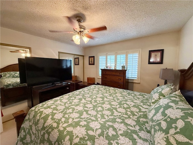 4474 Juanita Ct, Chino, CA 91710 - bedroom featuring a textured ceiling, a ceiling fan, and a closet