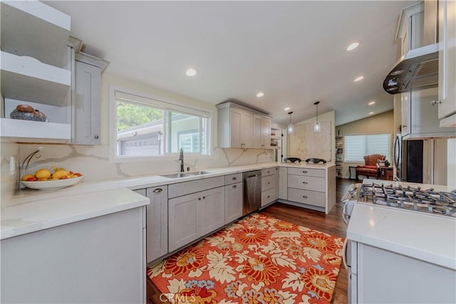 5276 Willow Wood Rd, Rolling Hills Estates, CA 90274 - kitchen with vaulted ceiling, light wood-style floors, stainless steel dishwasher, backsplash, and hanging light fixtures
