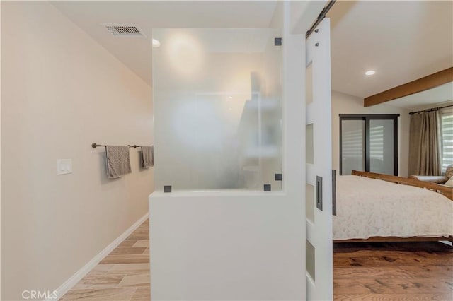 5276 Willow Wood Rd, Rolling Hills Estates, CA 90274 - full bathroom with a walk in shower, wood finished floors, ensuite bathroom, and recessed lighting