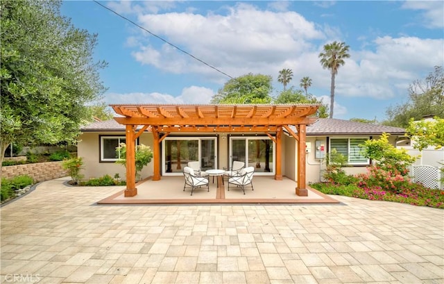 5276 Willow Wood Rd, Rolling Hills Estates, CA 90274 - rear view of property featuring a pergola, a wooden deck, and stucco siding