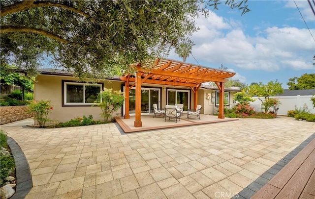 5276 Willow Wood Rd, Rolling Hills Estates, CA 90274 - back of property with a pergola, a patio area, and stucco siding