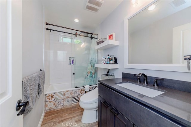 5276 Willow Wood Rd, Rolling Hills Estates, CA 90274 - full bath featuring tiled shower / bath, wood finished floors, vanity, and recessed lighting