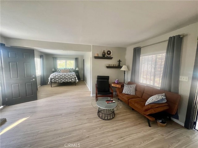 2226 Evans Dr, Arrowbear, CA 92382 - living area with light wood-style floors and baseboards