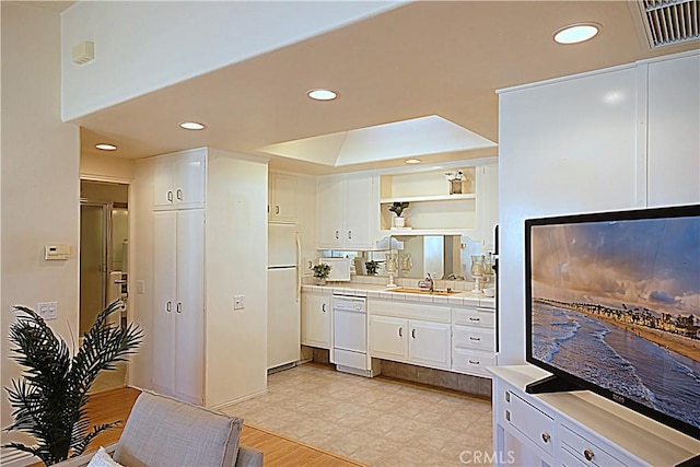 1681 Tam Oshanter Rd Unit 10C M12, Seal Beach, CA 90740 - kitchen with white appliances, tile counters, white cabinetry, recessed lighting, and open shelves