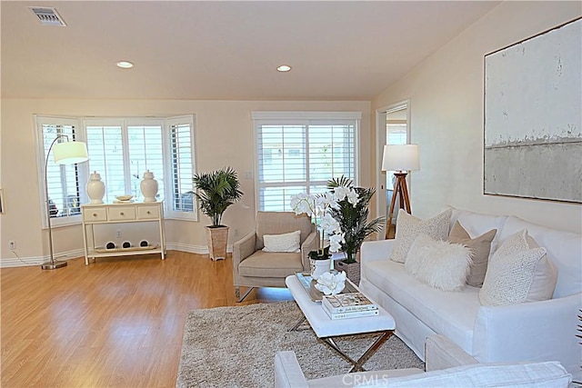 1681 Tam Oshanter Rd Unit 10C M12, Seal Beach, CA 90740 - living area with light wood-style floors and recessed lighting