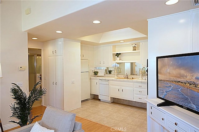 1681 Tam Oshanter Rd Unit 10C M12, Seal Beach, CA 90740 - kitchen featuring white appliances, tile counters, white cabinetry, open shelves, and recessed lighting