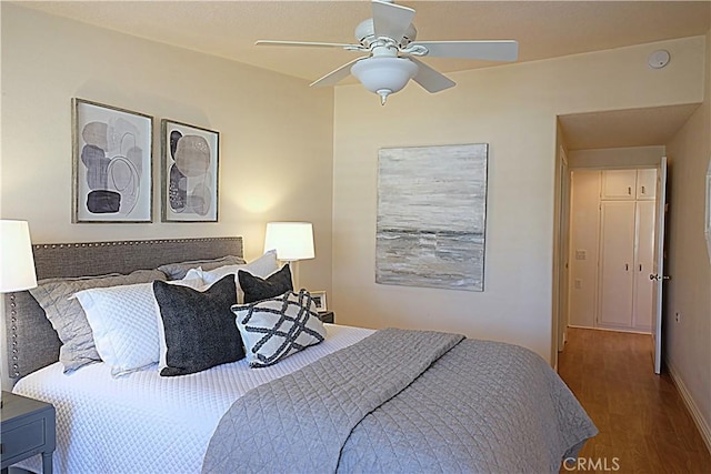 1681 Tam Oshanter Rd Unit 10C M12, Seal Beach, CA 90740 - bedroom featuring wood finished floors and a ceiling fan