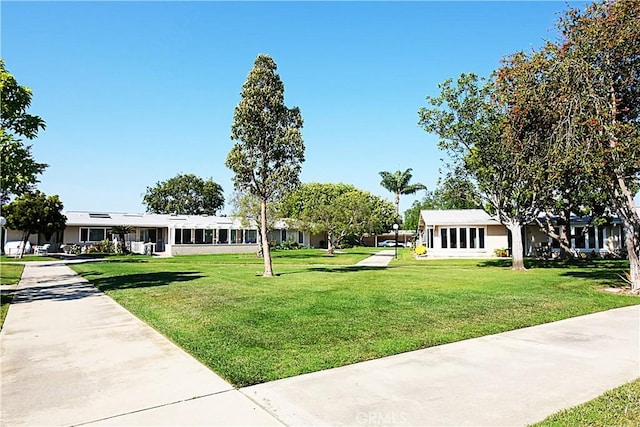 1681 Tam Oshanter Rd Unit 10C M12, Seal Beach, CA 90740 - view of property's community with a lawn