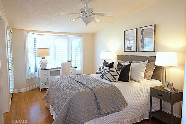 1681 Tam Oshanter Rd Unit 10C M12, Seal Beach, CA 90740 - bedroom featuring wood finished floors, lofted ceiling, and a ceiling fan
