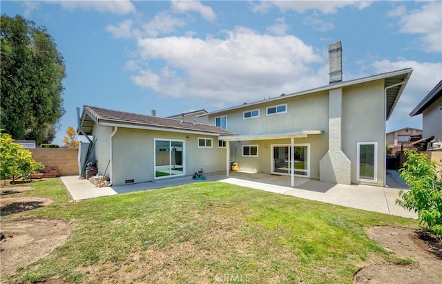 2406 Descanso Way, Torrance, CA 90504 - rear view of house with stucco siding, a patio, and a chimney