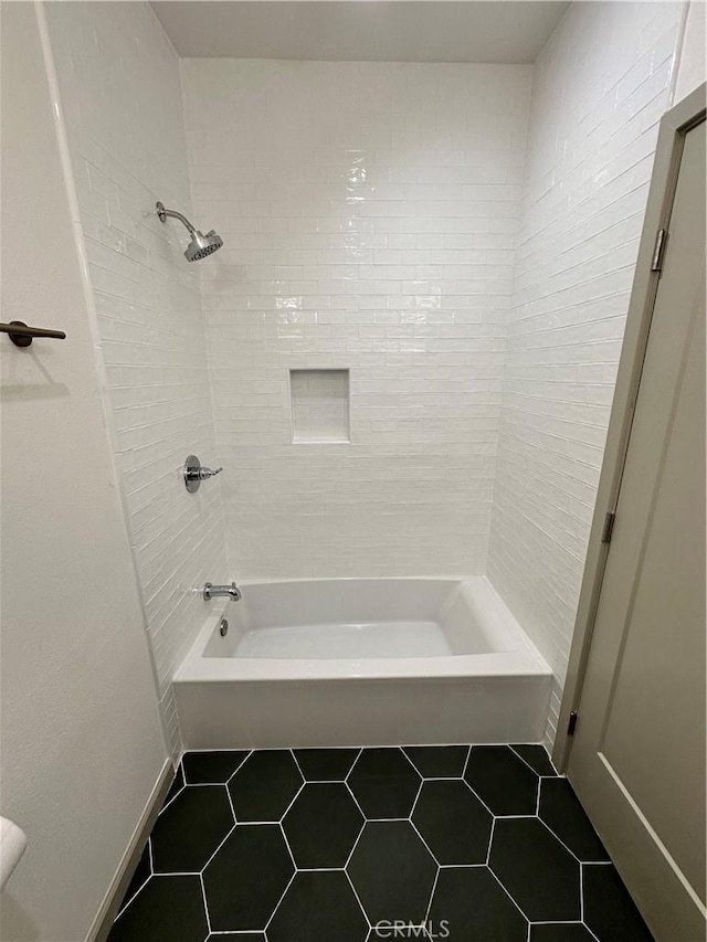 1241 W 22nd St, Los Angeles, CA 90007 - bathroom featuring tile patterned flooring and tub / shower combination