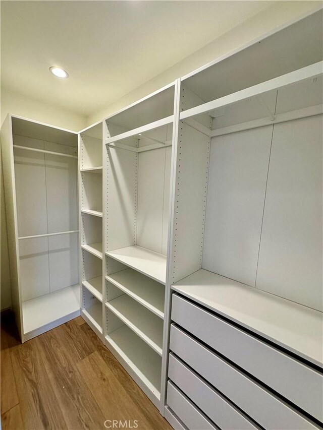 1241 W 22nd St, Los Angeles, CA 90007 - walk in closet featuring wood finished floors