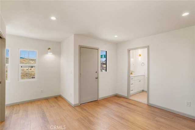 1241 W 22nd St, Los Angeles, CA 90007 - unfurnished room featuring light wood-type flooring and recessed lighting