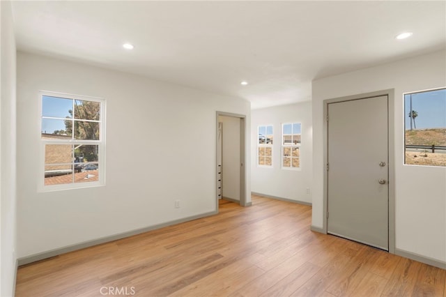 1241 W 22nd St, Los Angeles, CA 90007 - unfurnished room featuring light wood-style floors and recessed lighting