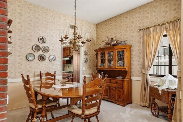 27815 Sheffield, Mission Viejo, CA 92692 - dining space featuring wallpapered walls, a chandelier, light colored carpet, and a wainscoted wall