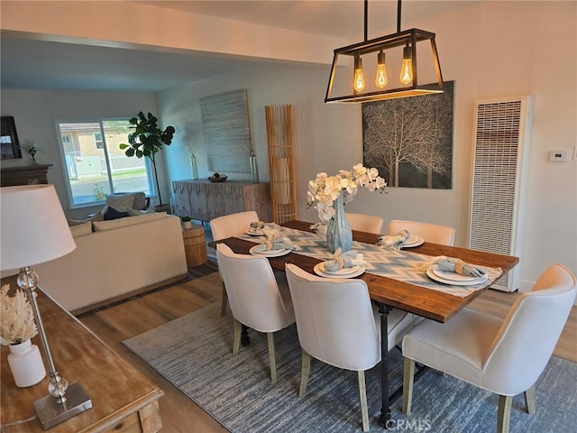 24921 Cypress St, Lomita, CA 90717 - dining room with a heating unit and wood finished floors
