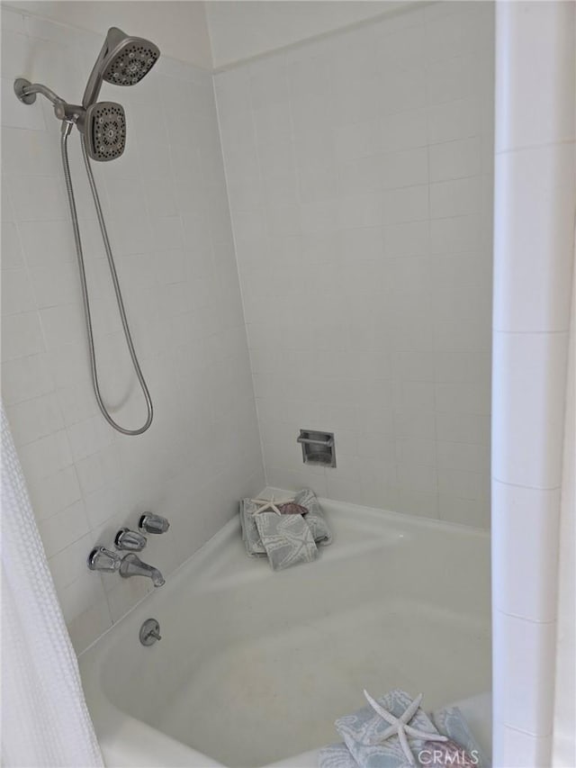 24921 Cypress St, Lomita, CA 90717 - bathroom featuring shower / bath combo with shower curtain