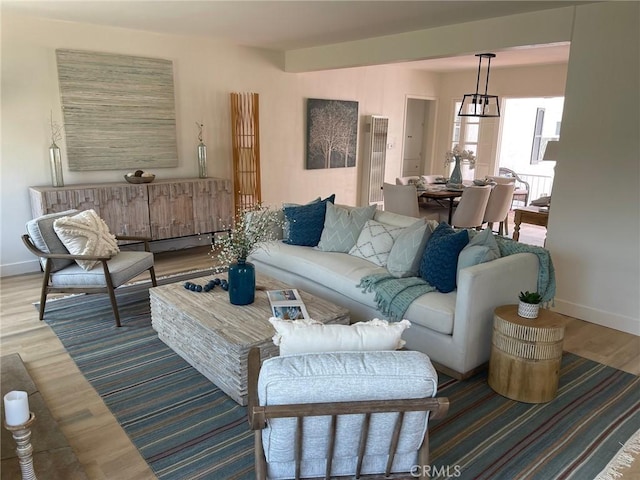 24921 Cypress St, Lomita, CA 90717 - living area featuring wood finished floors and a heating unit