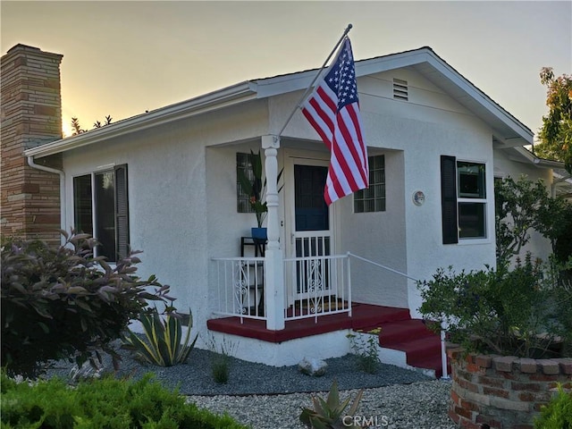 24921 Cypress St, Lomita, CA 90717 - view of front of house with stucco siding and a porch