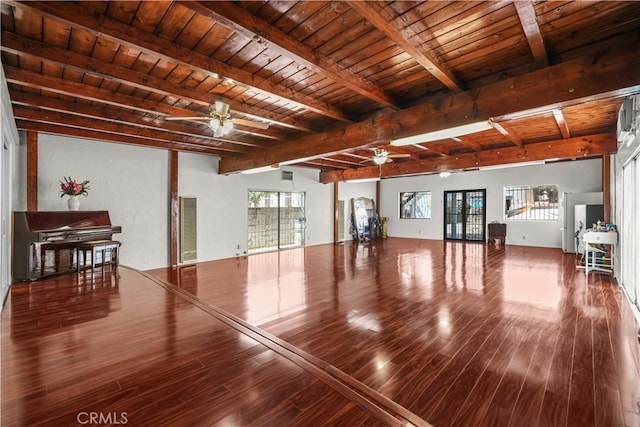 1067 N Wilton Pl, Los Angeles, CA 90038 - unfurnished living room with a ceiling fan, wood finished floors, and a wood ceiling with exposed beams