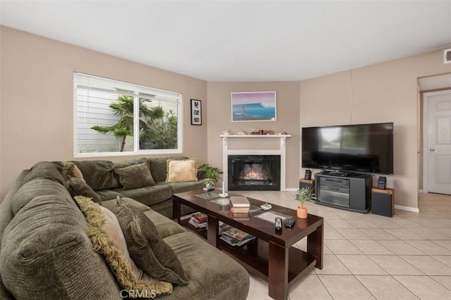 34055 Silver Lantern St, Dana Point, CA 92629 - living room featuring light tile patterned floors and a glass covered fireplace