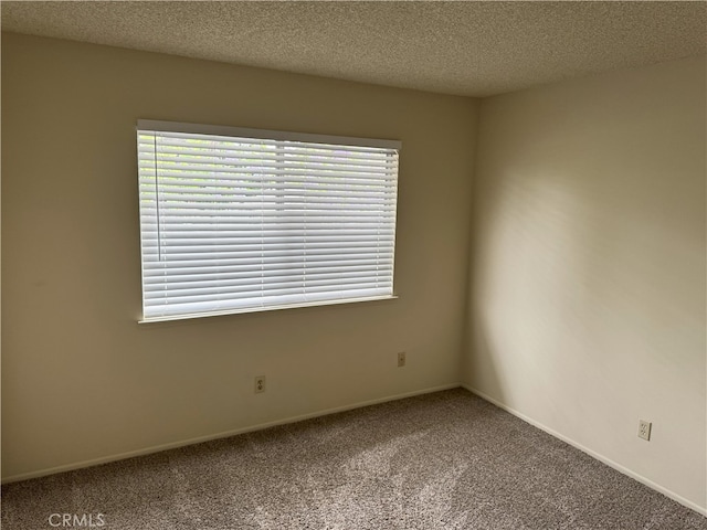 3078 Winfield Ave, La Verne, CA 91750 - empty room featuring carpet, healthy amount of natural light, and a textured ceiling