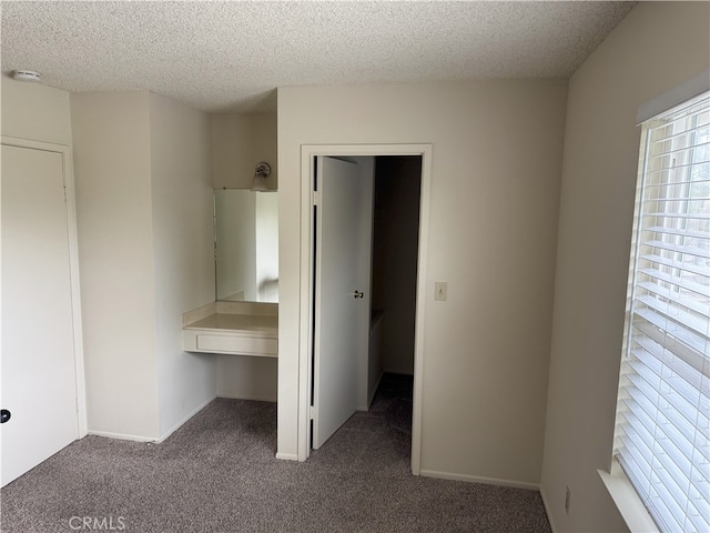 3078 Winfield Ave, La Verne, CA 91750 - unfurnished bedroom featuring carpet floors and a textured ceiling