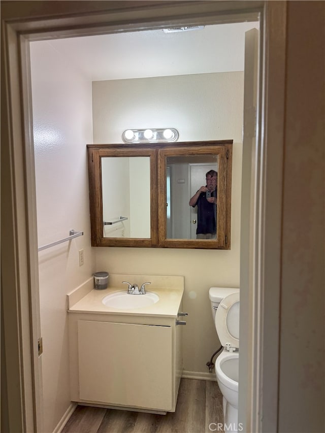 3078 Winfield Ave, La Verne, CA 91750 - half bath with wood finished floors and vanity
