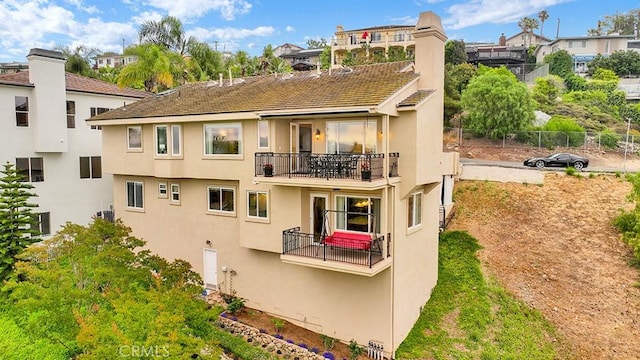 12272 Media Panorama, North Tustin, CA 92705 - rear view of property with a balcony and stucco siding