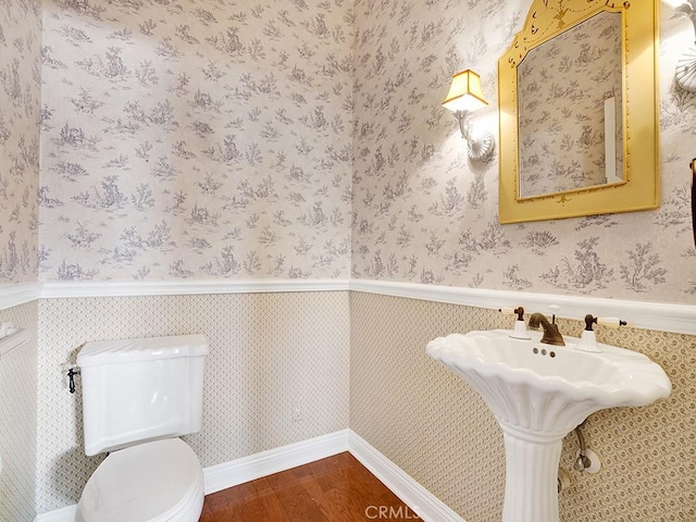 12272 Media Panorama, North Tustin, CA 92705 - half bathroom featuring wood finished floors and toilet
