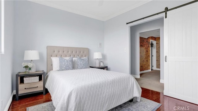 12272 Media Panorama, North Tustin, CA 92705 - bedroom with crown molding, a barn door, and wood finished floors