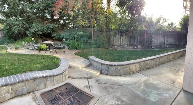 3854 Canvasback Ct, Merced, CA 95340 - fenced yard featuring a patio and a fire pit